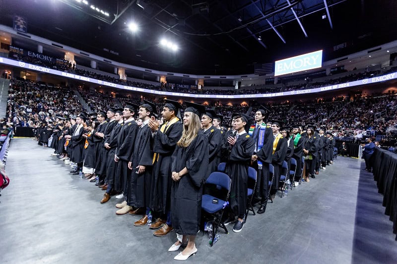 Graduates stand and applaud at Goizueta Commencement 2024