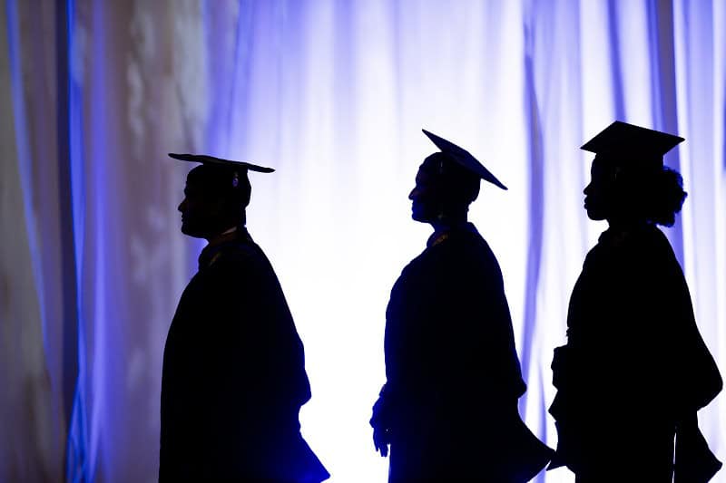 Students process at Goizueta Commencement 2024.