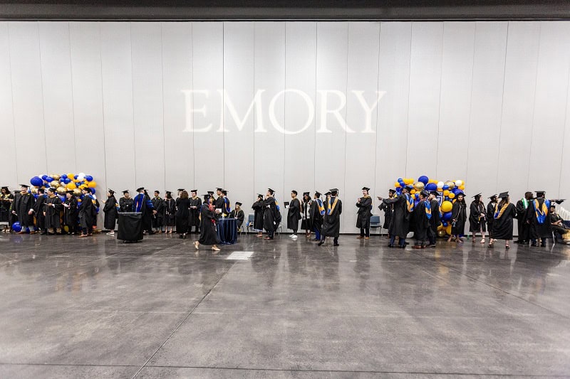 Graduates queue in lines waiting to process at the beginning of Goizueta Commencement 2024